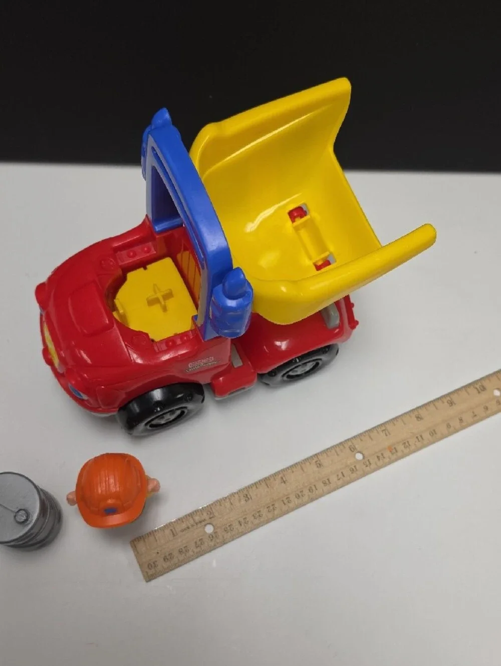 Fisher-Price Little People Red & Yellow Dump Truck with Figure And Accessory